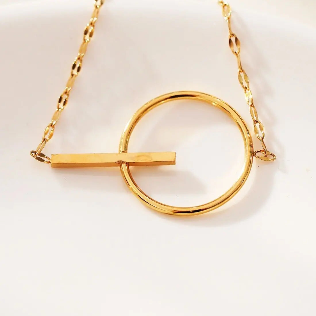 Bracelet doré cercle et barre Eclat Paris
