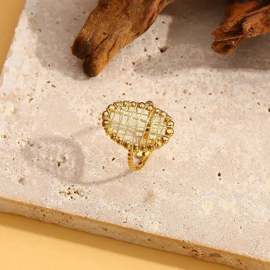Bague dorée ovale avec grille Eclat Paris