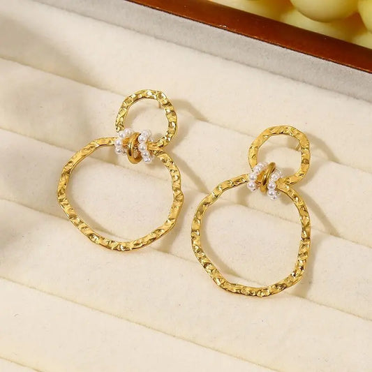 Boucles d'oreilles Dorées deux Cercles Liés Martelés Eclat Paris