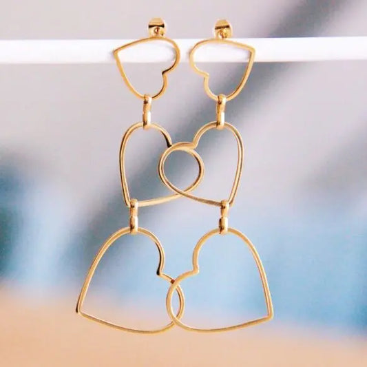 Boucles d'oreilles longues avec 3 cœurs ouverts Bazou