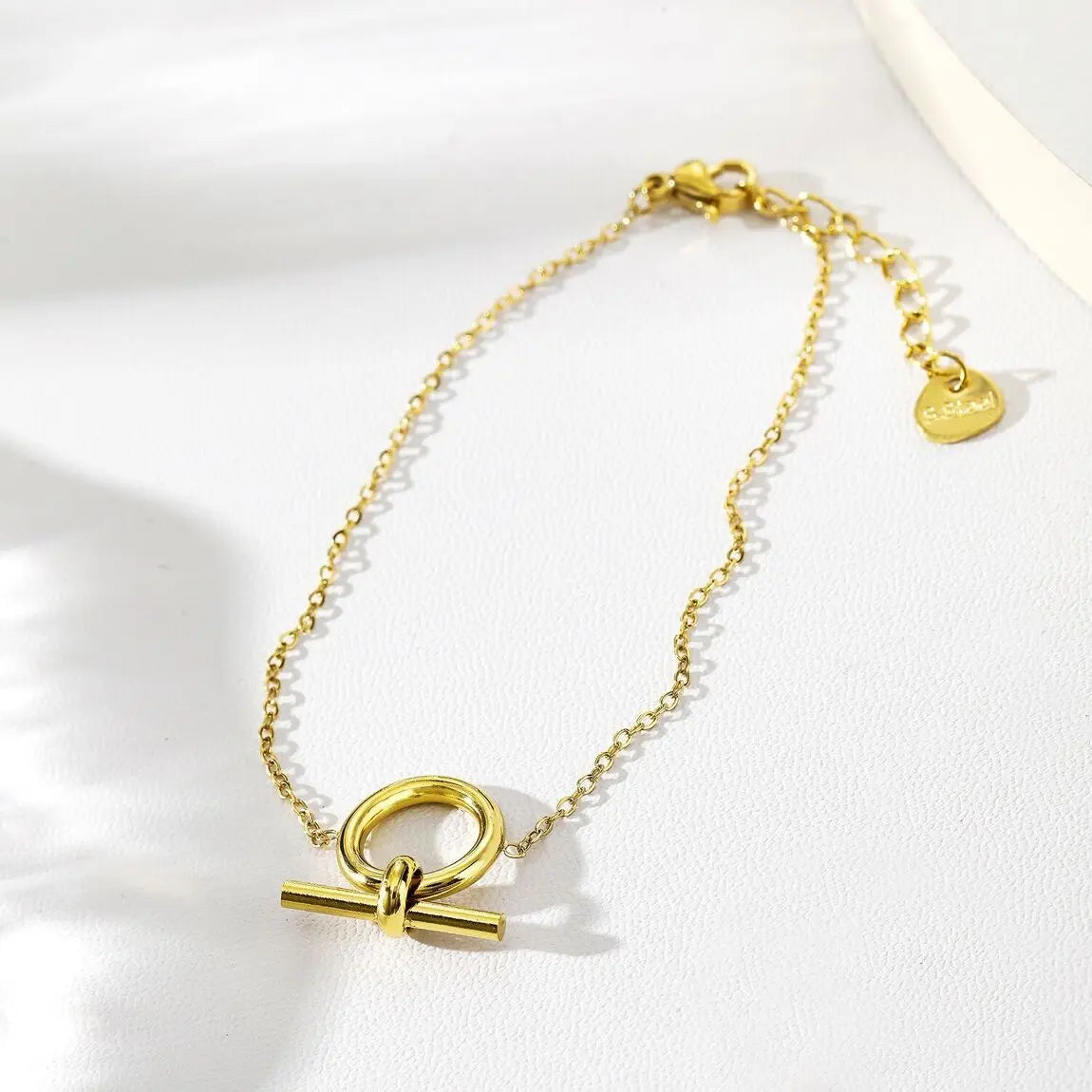 Bracelet chaîne dorée avec cercle et barre Eclat Paris
