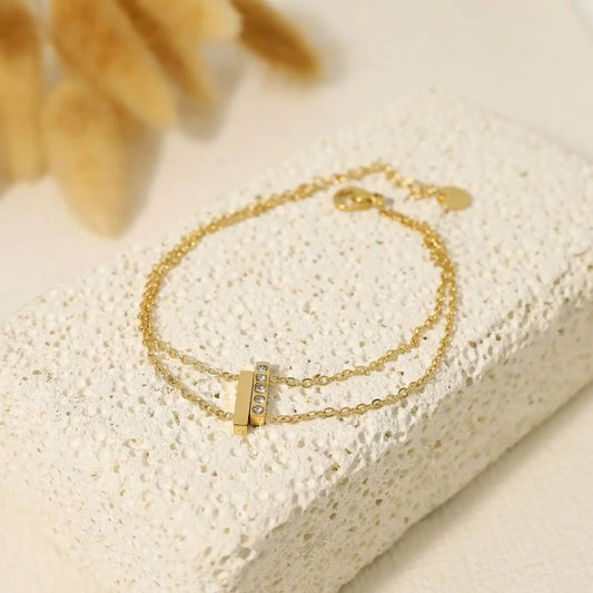 Bracelet double chaîne avec deux barres dont une dorée Eclat Paris