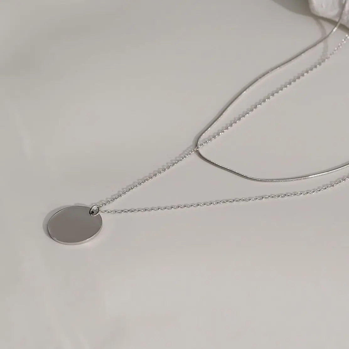Collier  Double Chaînes Serpent Et Mailles Avec Pendentif Disque Eclat Paris
