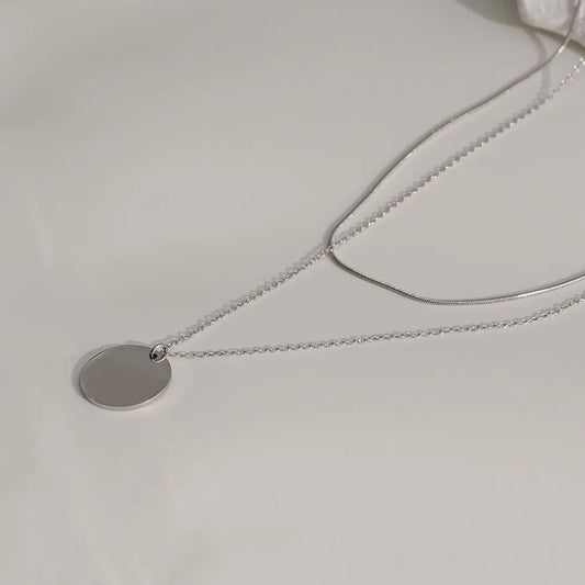 Collier  Double Chaînes Serpent Et Mailles Avec Pendentif Disque Eclat Paris