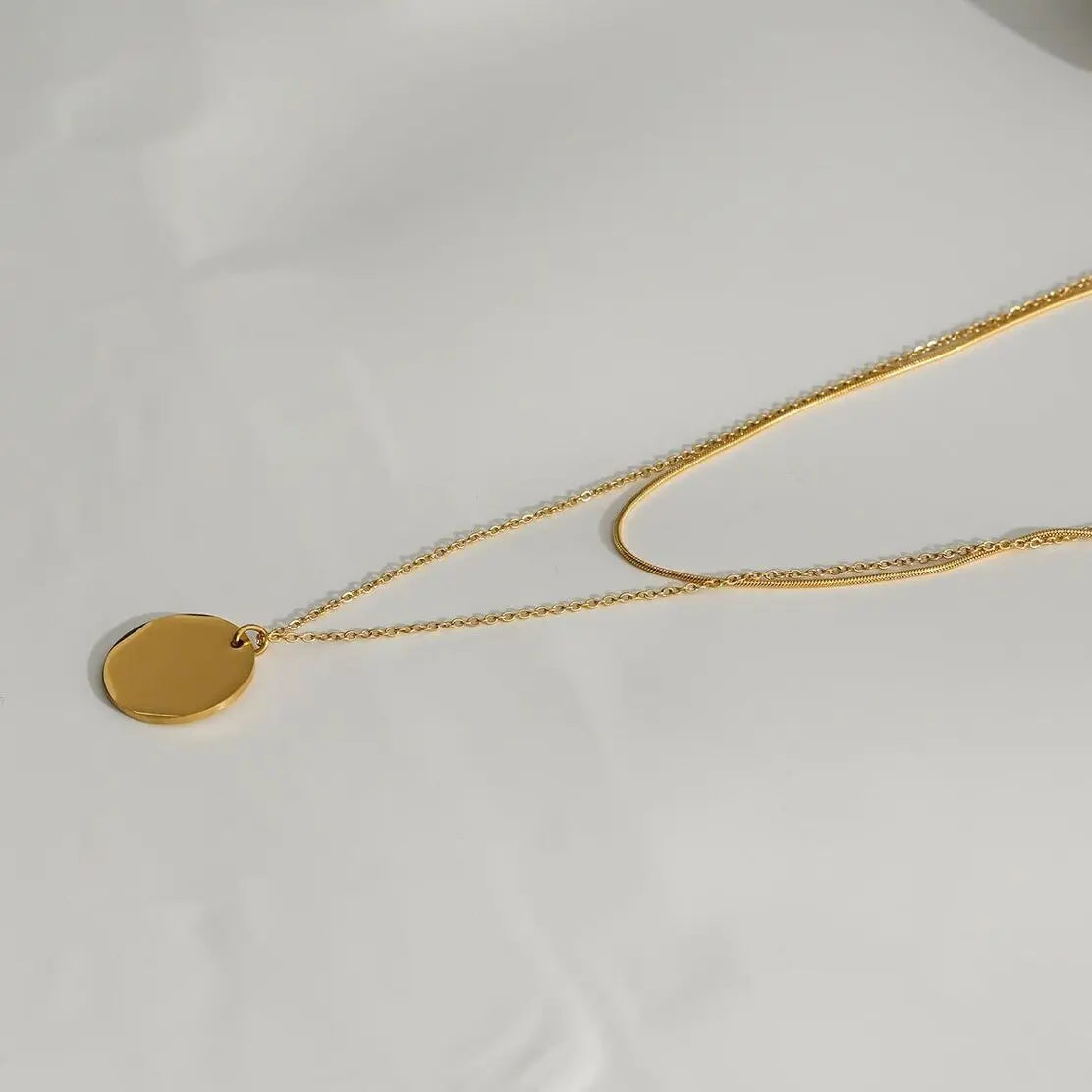 Collier  Double Chaînes Serpent Et Mailles Avec Pendentif Disque Eclat Paris