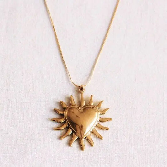 Collier long tressé avec cœur et rayons Bazou