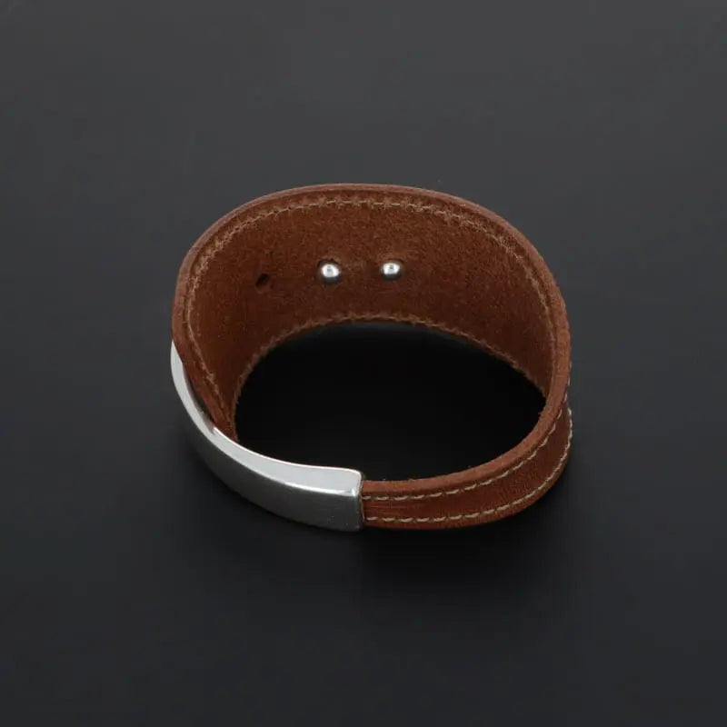 Manchette réglable en cuir et en plaqué argent, design étrier SECRET DE CUIR Secret de cuir