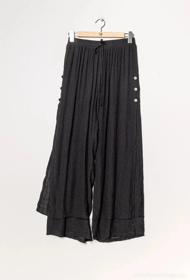 Pantalon large à fente noir world fashion